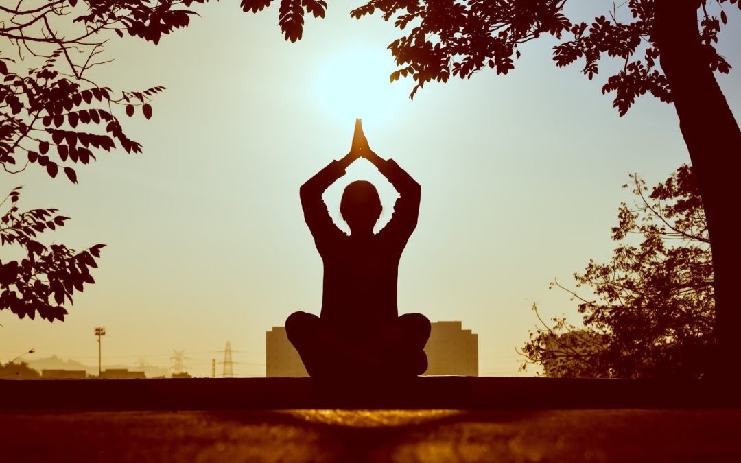 a photo a man meditating